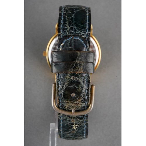 7 - A Bugatti chronograph quartz wristwatch. The dark blue dial with white Arabic numerals, moon phase a... 