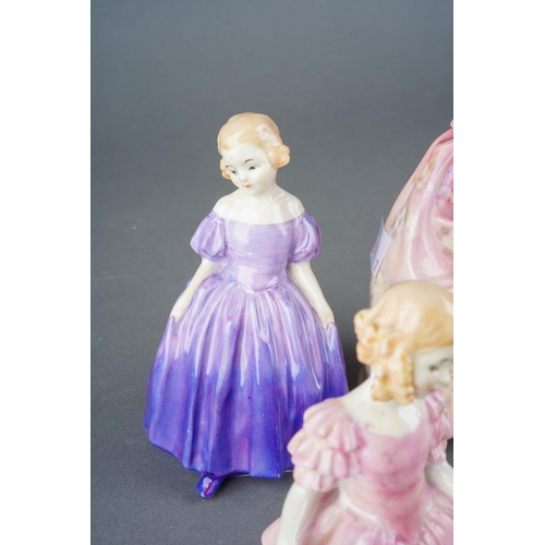 72 - A collection of seven Royal Doulton figures, comprising 