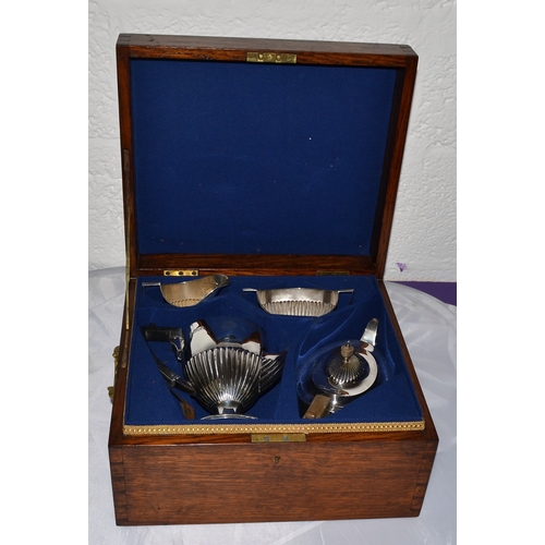 335 - A stunning solid silver 4 piece tea and coffee service contained in a good quality oak campaign box.... 