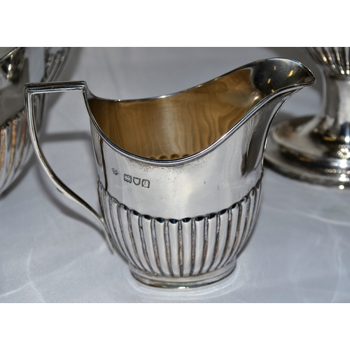 335 - A stunning solid silver 4 piece tea and coffee service contained in a good quality oak campaign box.... 