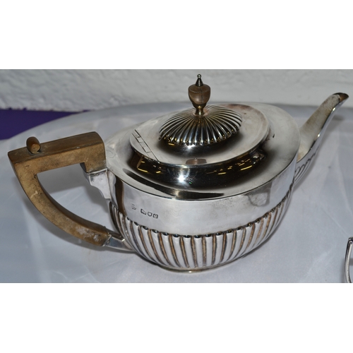 335 - A stunning solid silver 4 piece tea and coffee service contained in a good quality oak campaign box.... 