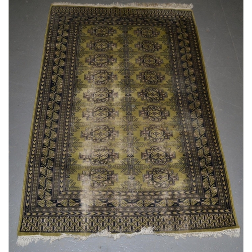 4 - A vintage green ground Bokhara style rug - Approx 4ft x 3ft 6