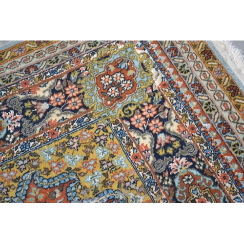 15 - A superb quality colourful Persian silk rug - approximately 5ft by 3ft