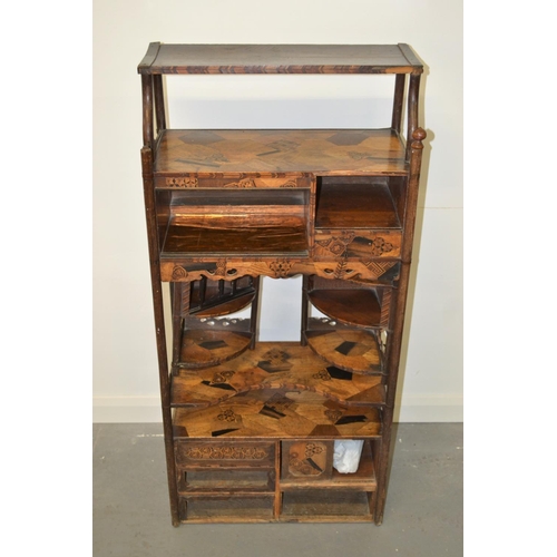 16 - A late 19th/ Early 20th century Japanese specimen wood parquetry floor standing side cabinet. Approx... 