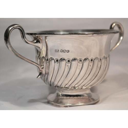 302 - A silver sugar bowl with fluted decoration - Sheffield 1924 by the Atkin Brothers - 7.86 ozt