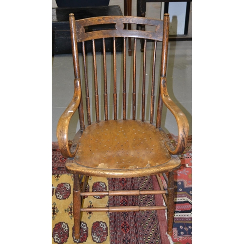 25 - A vintage oak slat backed arm chair c.1900