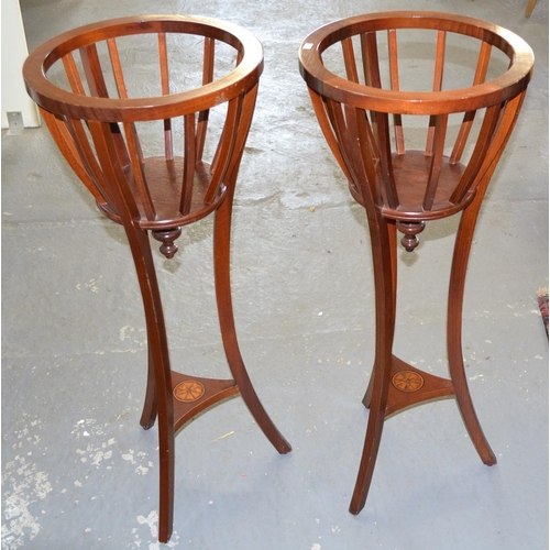36 - A pair of Edwardian Sheraton revival jardiniere stands