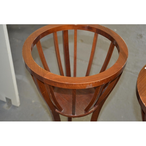 36 - A pair of Edwardian Sheraton revival jardiniere stands