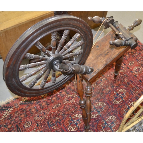 38 - A 19th century wooden spinning wheel