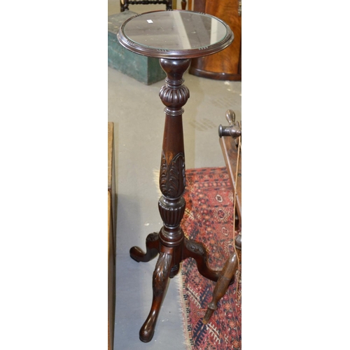 39 - A vintage carved wooden pedestal with a glass top