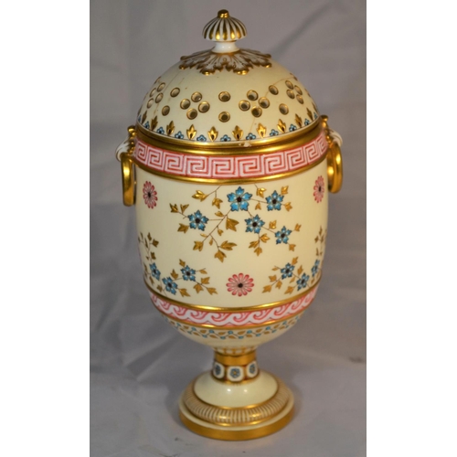 391 - An unusual hand painted Minton covered vase with pierced cover -1873-1912 mark - approx 8