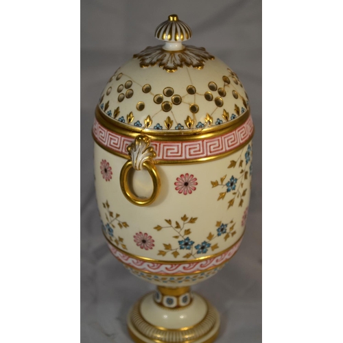 391 - An unusual hand painted Minton covered vase with pierced cover -1873-1912 mark - approx 8