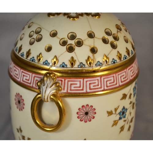 391 - An unusual hand painted Minton covered vase with pierced cover -1873-1912 mark - approx 8