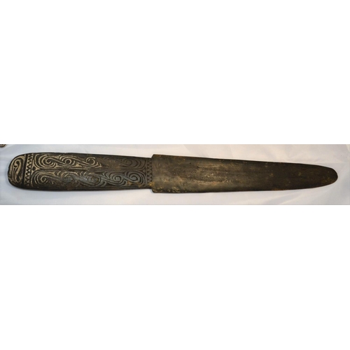 402 - An unusual antique carved wooden tool possibly Maori or South Sea Islands. The handle carved with wa... 