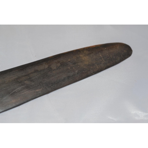 402 - An unusual antique carved wooden tool possibly Maori or South Sea Islands. The handle carved with wa... 