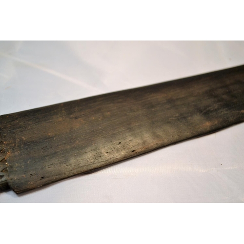 402 - An unusual antique carved wooden tool possibly Maori or South Sea Islands. The handle carved with wa... 