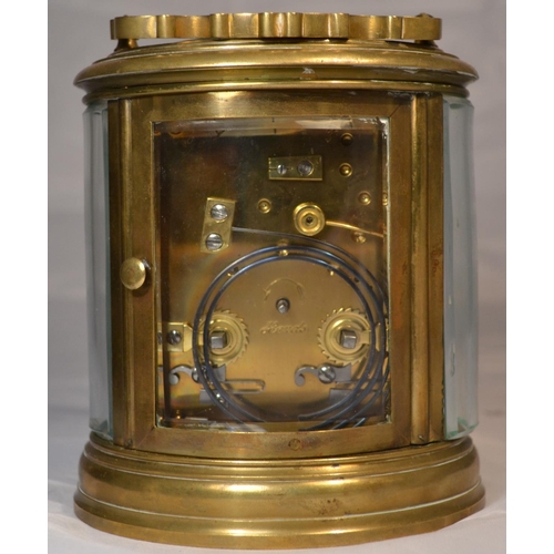 240 - A Victorian oval carriage clock in original leather case