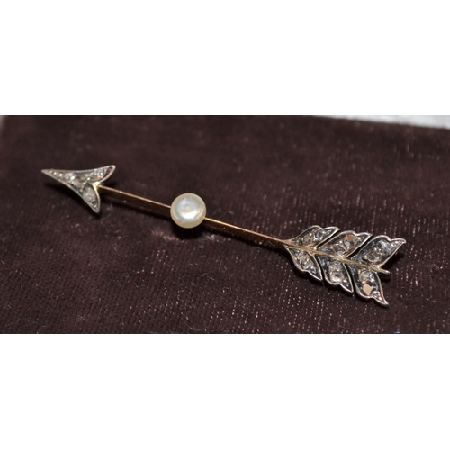 348 - A yellow metal, diamond and seed pearl brooch formed as an arrow. Approx 2