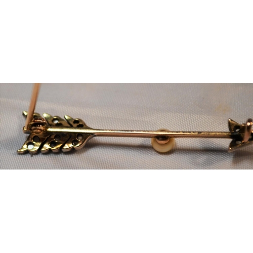 348 - A yellow metal, diamond and seed pearl brooch formed as an arrow. Approx 2