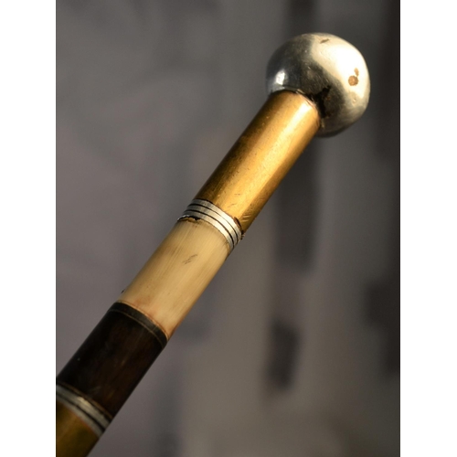 112 - An unusual vintage swagger stick made from bullet casings and horn. Approx 24