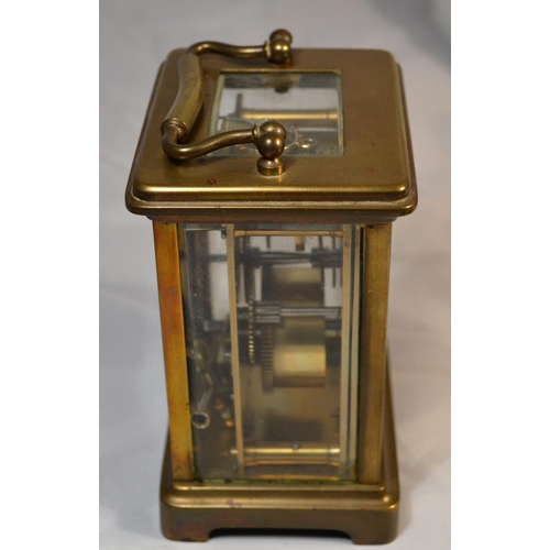 243 - A vintage brass cased mechanical carriage clock