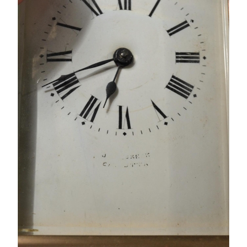 243 - A vintage brass cased mechanical carriage clock