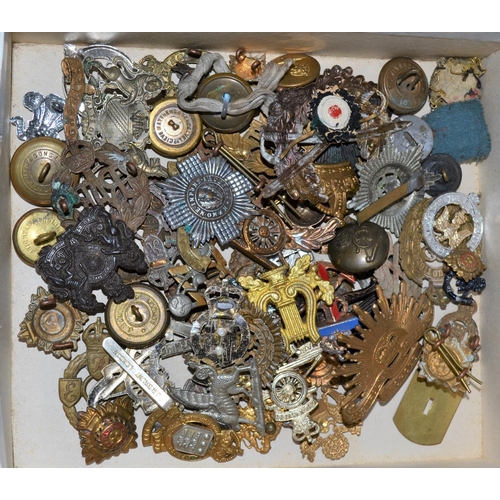 100 - A large collection of vintage military badges