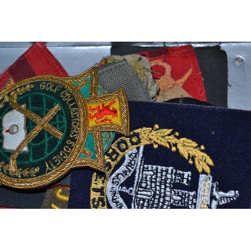 104 - A collection of vintage military patches