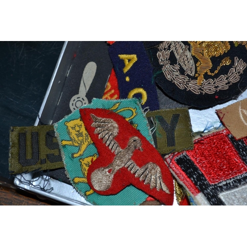 104 - A collection of vintage military patches