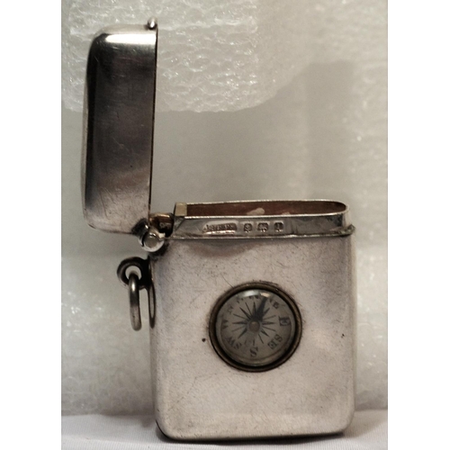 334 - A novelty silver vesta case inset with a compass - Birmingham 1910 by Saunders & Shepherd