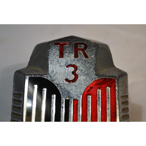 111 - A Triumph TR3 enamel car badge