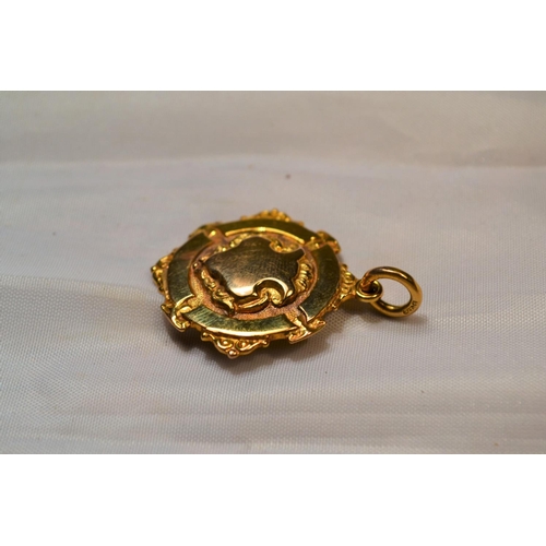 392 - A 9ct gold fob medal for the Royal Marines 1929-30