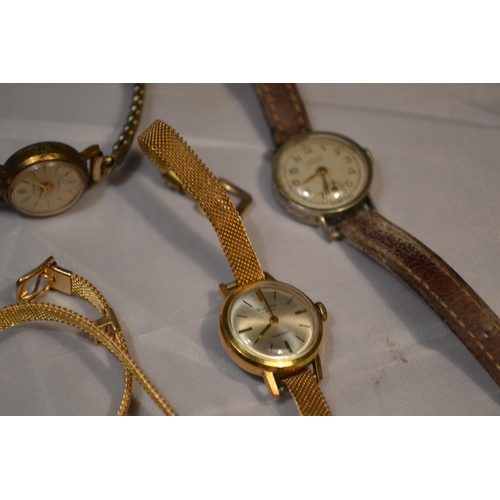 397 - A collection of gold and yellow metal ladies watches