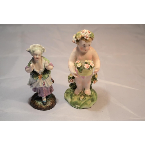 408 - 2 small porcelain figure of a boy and a woman - probably Continental and 19th century