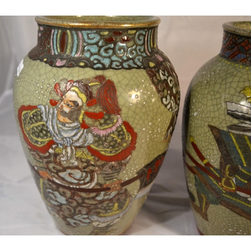 413 - Two enamelled crackle glaze vases, Meiji/ Taisho period. Each painted with Samurai warriors with red... 