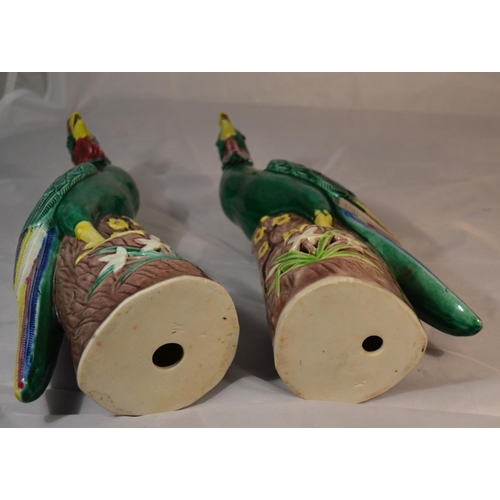 416 - A pair of vintage colourful figures of birds - possibly Chinese and early 20th Century - approx 12