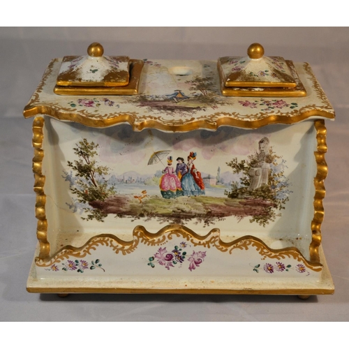 421 - An antique Delft or Faience desk stand with hand painted scenes. Likely 19th century. Marked verso