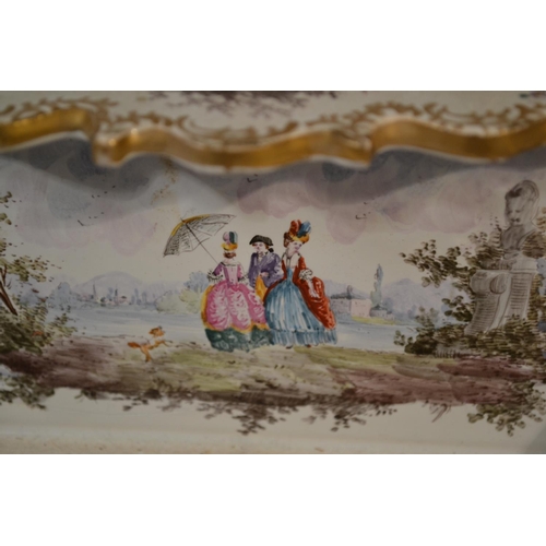 421 - An antique Delft or Faience desk stand with hand painted scenes. Likely 19th century. Marked verso