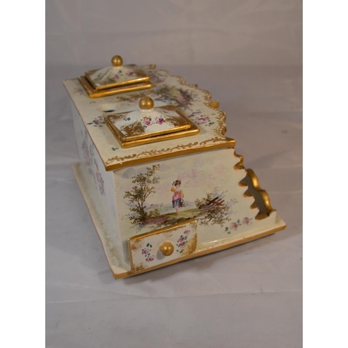 421 - An antique Delft or Faience desk stand with hand painted scenes. Likely 19th century. Marked verso