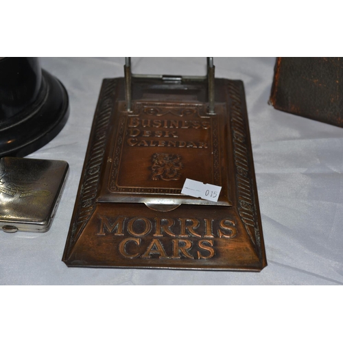 437 - A collection of vintage car memorabilia to include a Morris Cars business desk calendar stand