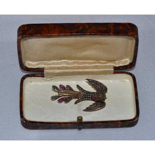 358 - A 19th Century gold, diamond and ruby set brooch in the form of a bird - 1.75