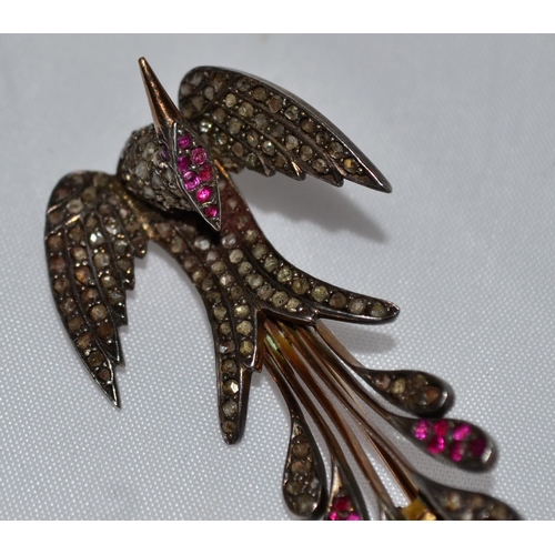 358 - A 19th Century gold, diamond and ruby set brooch in the form of a bird - 1.75