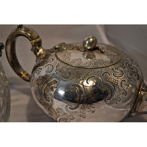 428 - An antique silver plated Samovar, a silver plate and cut glass biscuit barrel and a silver plated te... 