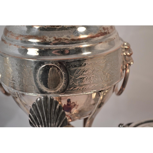 428 - An antique silver plated Samovar, a silver plate and cut glass biscuit barrel and a silver plated te... 