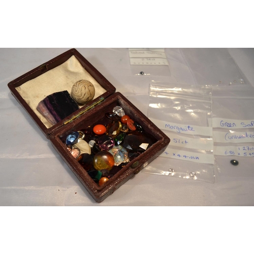 431 - A collection of unset gemstones and semi precious stones to include Sapphires