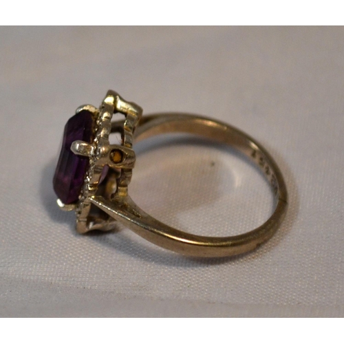 440 - An 18ct white gold and platinum amethyst and diamond cocktail ring - approx size L