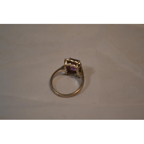 440 - An 18ct white gold and platinum amethyst and diamond cocktail ring - approx size L