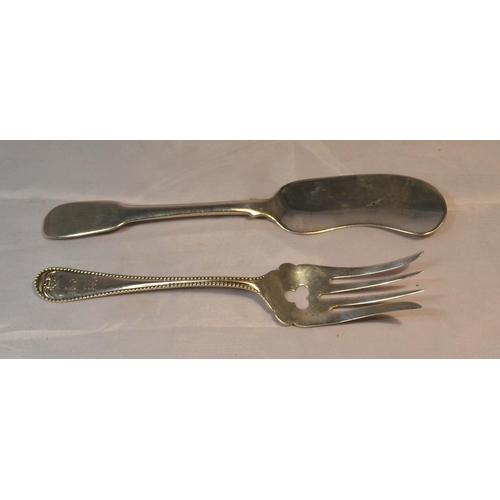 443 - 2 pieces of foreign silver - a American silver bread fork and an unusual white metal butter knife