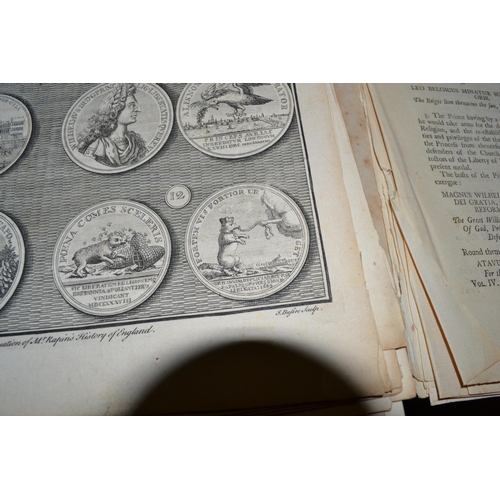 257 - A 17th century leather book cover from a book on Cambridge University and containing pages of medals... 