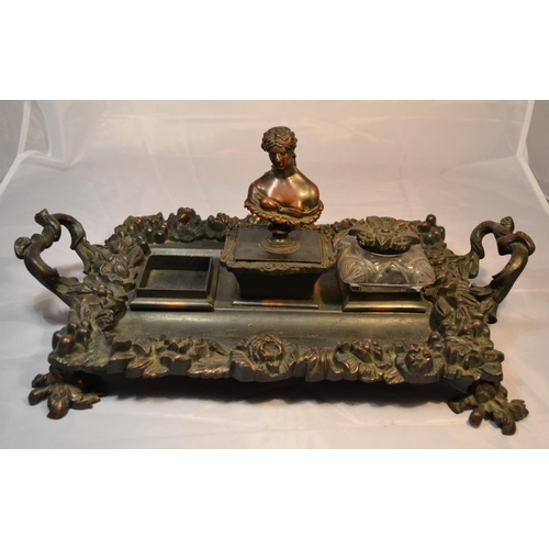 445 - An antique bronze desk stand mounted with classical figures - approx 17